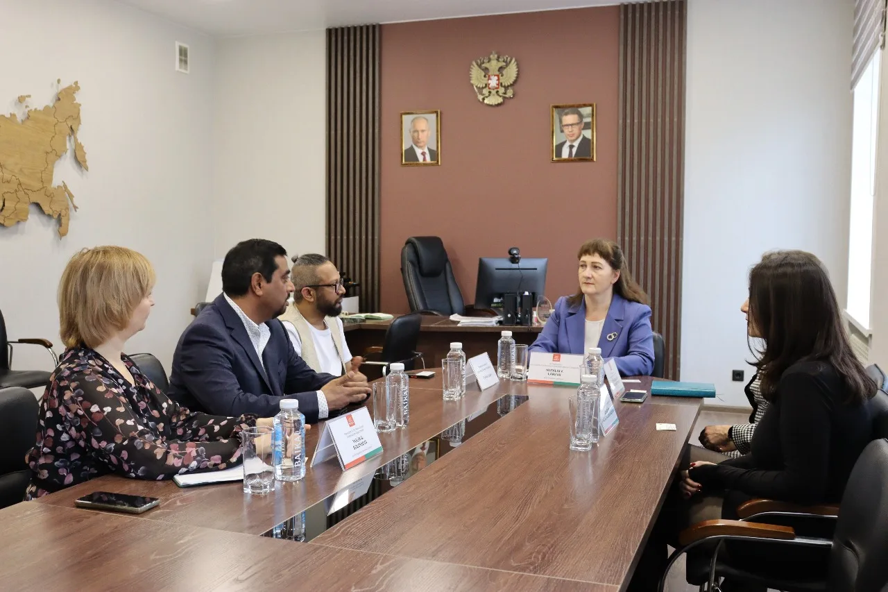 Academy representatives and delegates meeting around a conference table